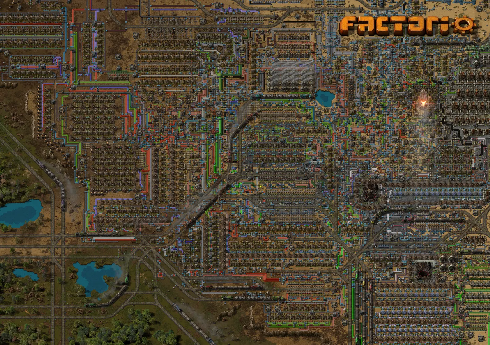 An enormous Factorio megabase resembling a dense city or the circuitry inside a processor